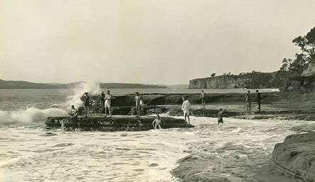 Internees enjoying swimming at Ocean Beach on Motuihe Island