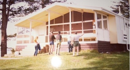 Terry and Ronnie being shown the kiosk by Hauraki Gulf Marine Park representatives in 1984