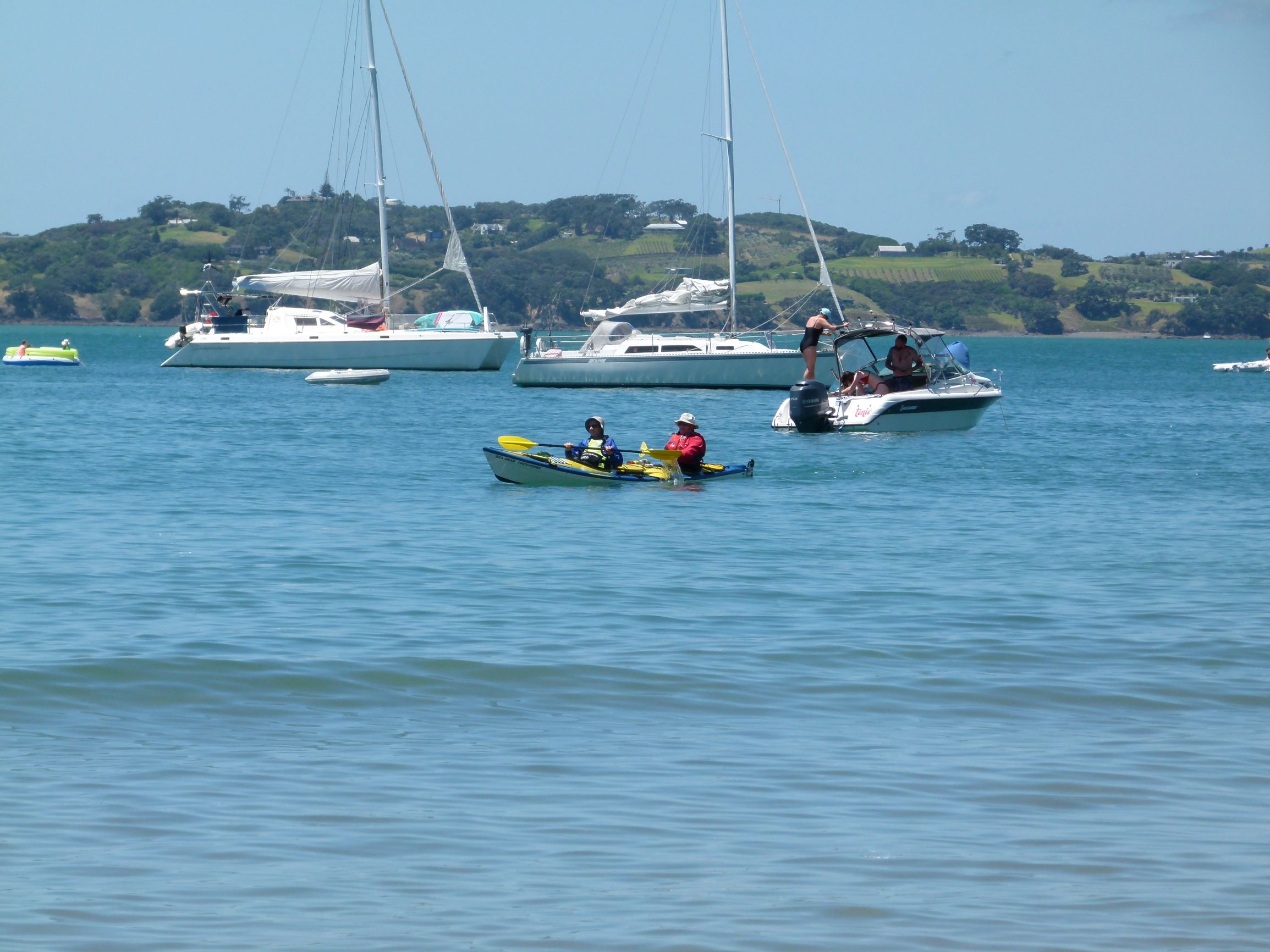 Families at the beach on Motuihe Island