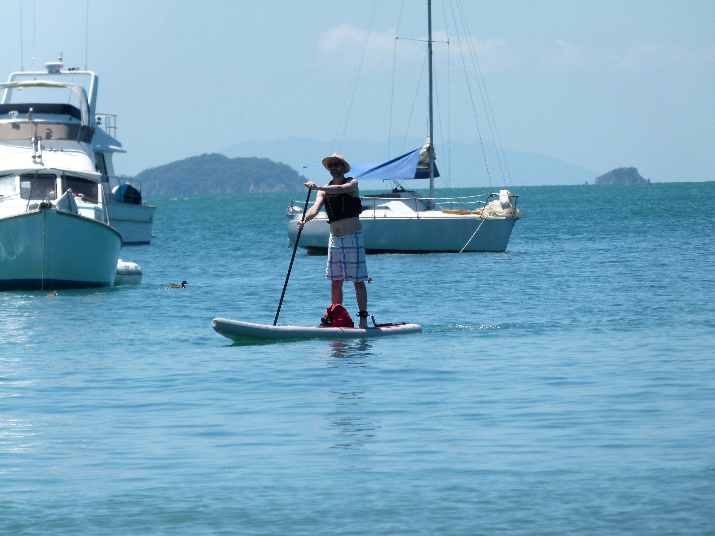 Children and families enjoying Motuihe Island beach